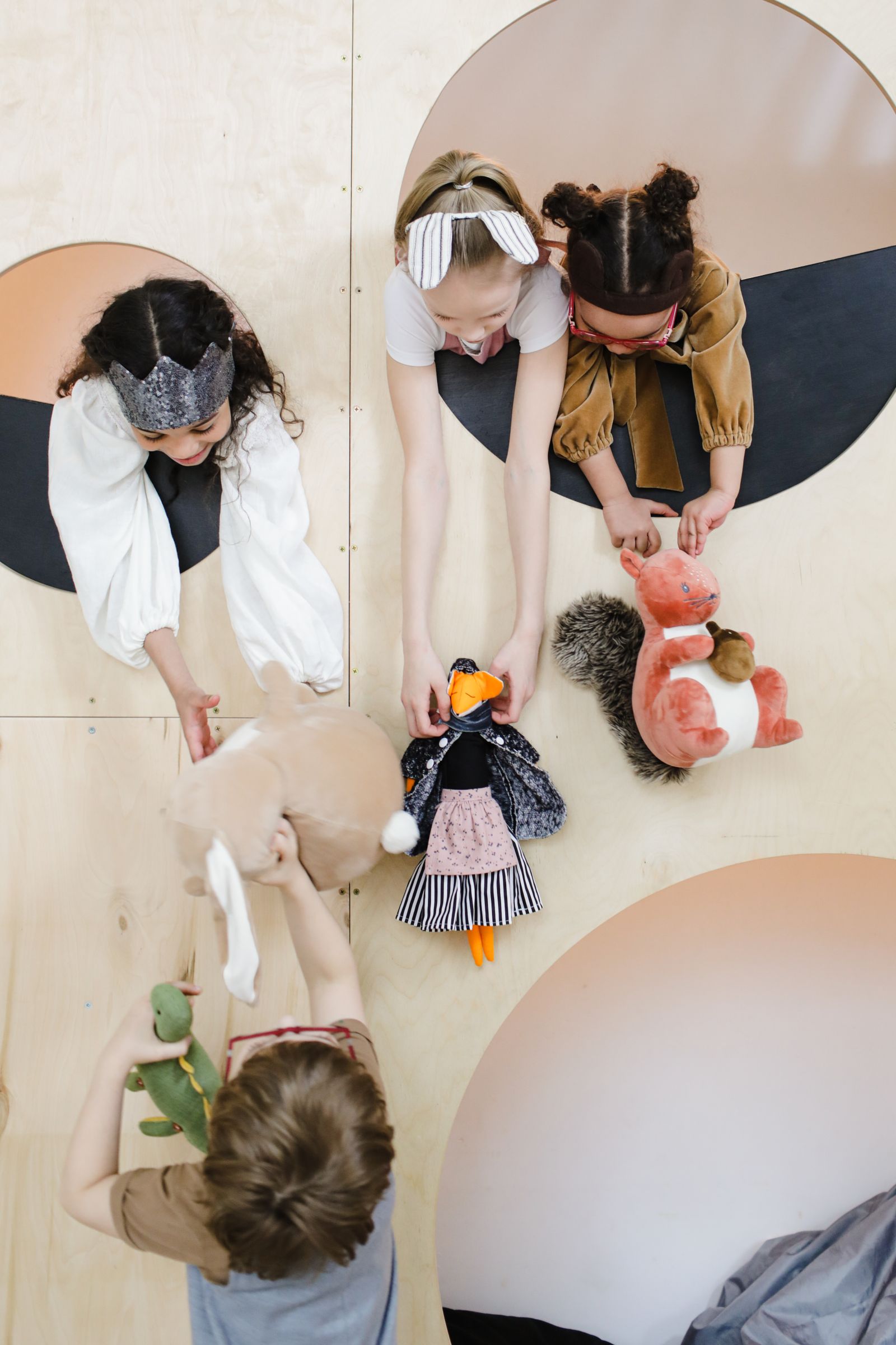 Children playing indoors during a home swap with kids in a family house